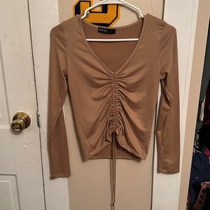 long sleeve, tan, adjustable crop top